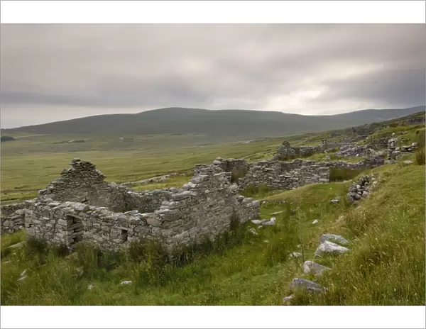 Deserted village at the base of Slievemore mountain