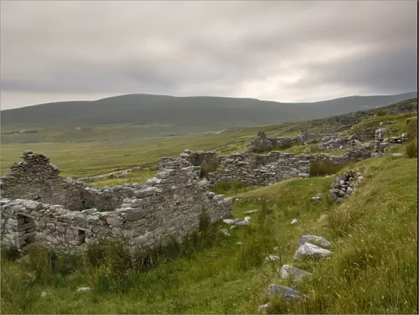 Deserted village at the base of Slievemore mountain