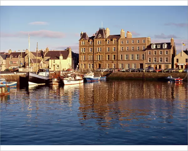 Boats in Kirkwall harbour at dusk