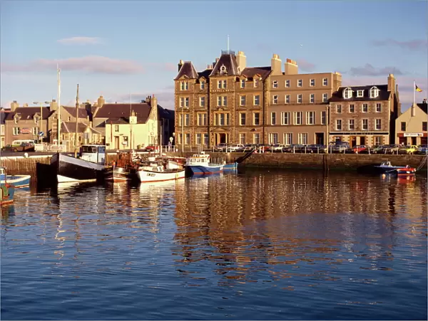 Boats in Kirkwall harbour at dusk