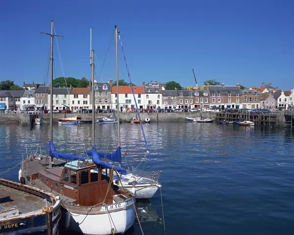 Boats on water and waterfront at Neuk of Fife