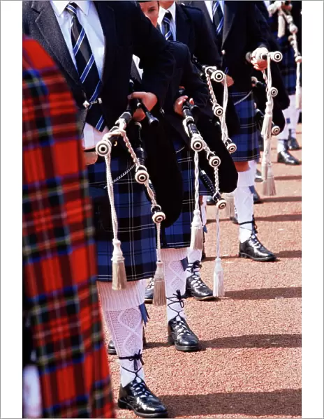 Bagpipe players with traditional Scottish uniform