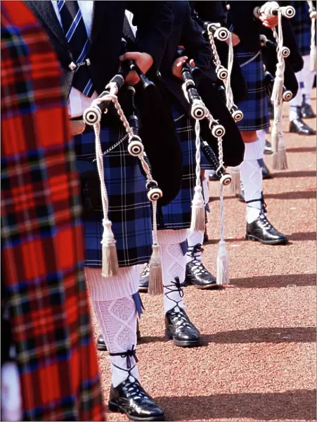 Bagpipe players with traditional Scottish uniform