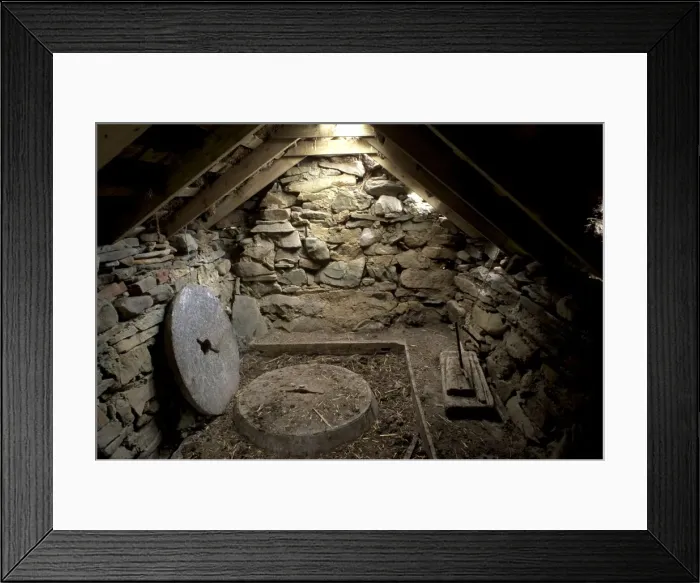 Framed Print : Interior of a restored old click mill alongside a small burn Framed Print : Interior of a restored old click mill alongside a small burn