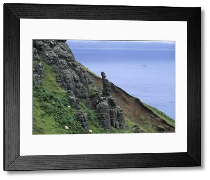 Framed Print : Rocky east coast of Trotternish and passing boat Framed Print : Rocky east coast of Trotternish and passing boat