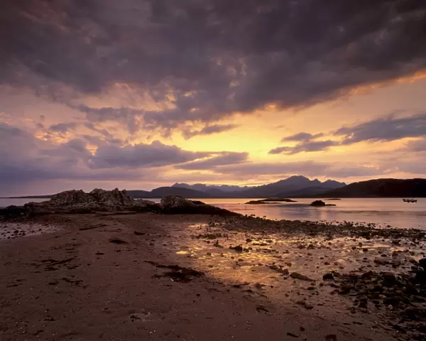 Black Cuillins range from the shores of Loch Eishort at sunset