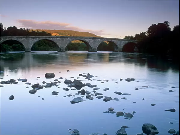 The seven-arched Dunkeld Bridge over the River Tay at dusk