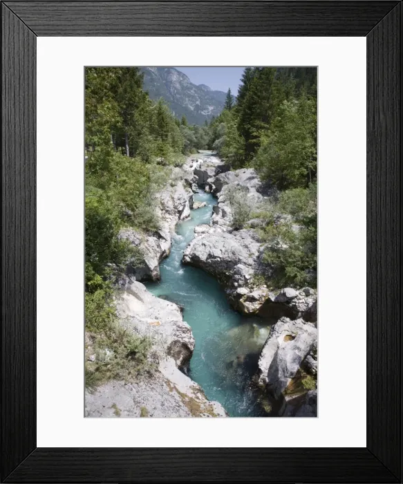 Framed Print : Soca River with clear emerald water flowing between Framed Print : Soca River with clear emerald water flowing between
