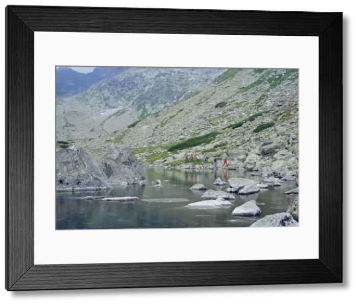 Framed Print : Hikers walking along Batizovske pleso Framed Print : Hikers walking along Batizovske pleso