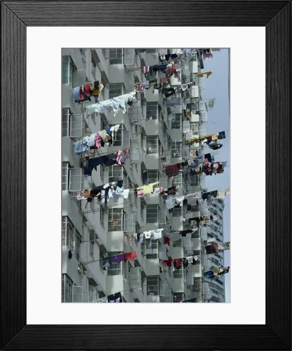 Framed Print : Close-up of washing hanging from bamboo poles outside Framed Print : Close-up of washing hanging from bamboo poles outside