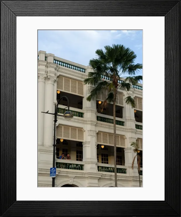 Framed Print : Two men enjoying a drink on balcony of Raffles Hotel Framed Print : Two men enjoying a drink on balcony of Raffles Hotel