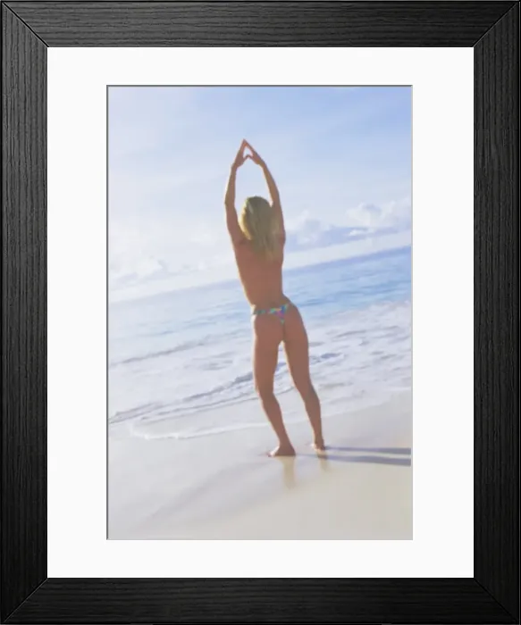 Framed Print : Woman stretching on the beach Framed Print : Woman stretching on the beach