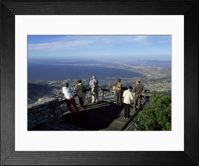 Framed Print : Tourists looking down at Cape Town from the top of Table Mountain Framed Print : Tourists looking down at Cape Town from the top of Table Mountain