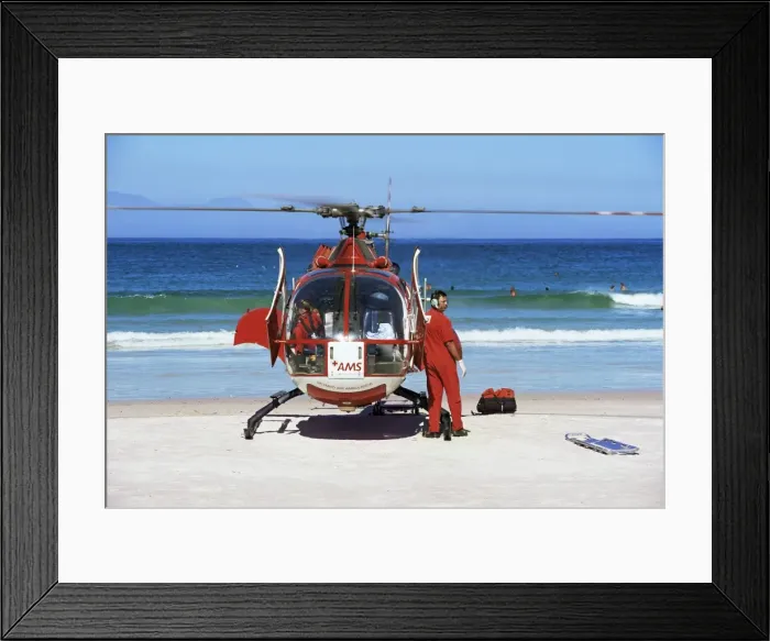 Framed Print : First aid medical helicopter lands on the beach Framed Print : First aid medical helicopter lands on the beach