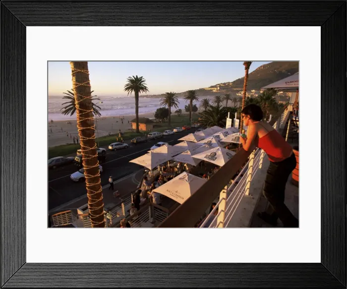 Framed Print : Young woman looking over Camps Bay Framed Print : Young woman looking over Camps Bay