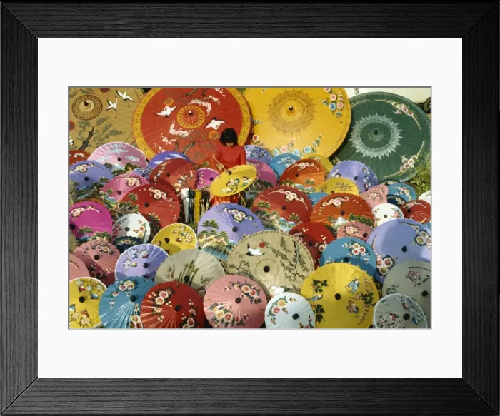Framed Print : Woman painting umbrellas at Bosang in Chiang Mai Framed Print : Woman painting umbrellas at Bosang in Chiang Mai