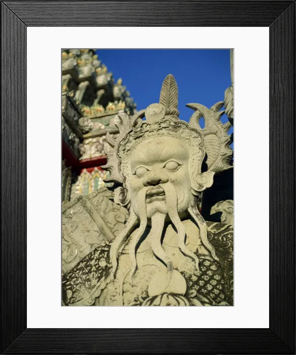 Framed Print : Close-up of the statue of a Chinese guard at the temple