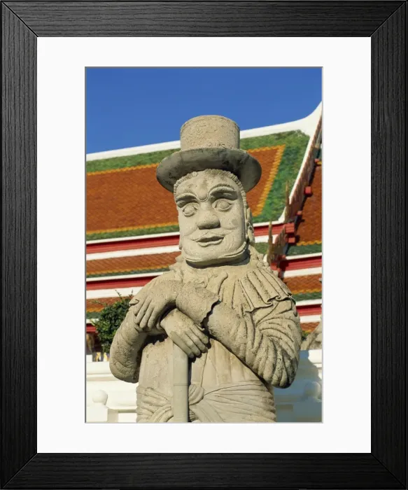 Framed Print : Close-up of a stone statue of a Farang guard Framed Print : Close-up of a stone statue of a Farang guard