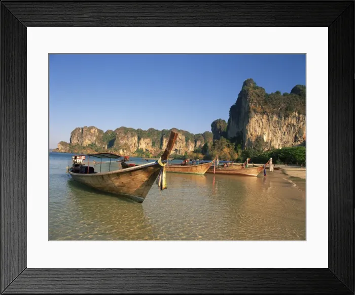 Framed Print : Long tail boats moored at Railay Beach Framed Print : Long tail boats moored at Railay Beach