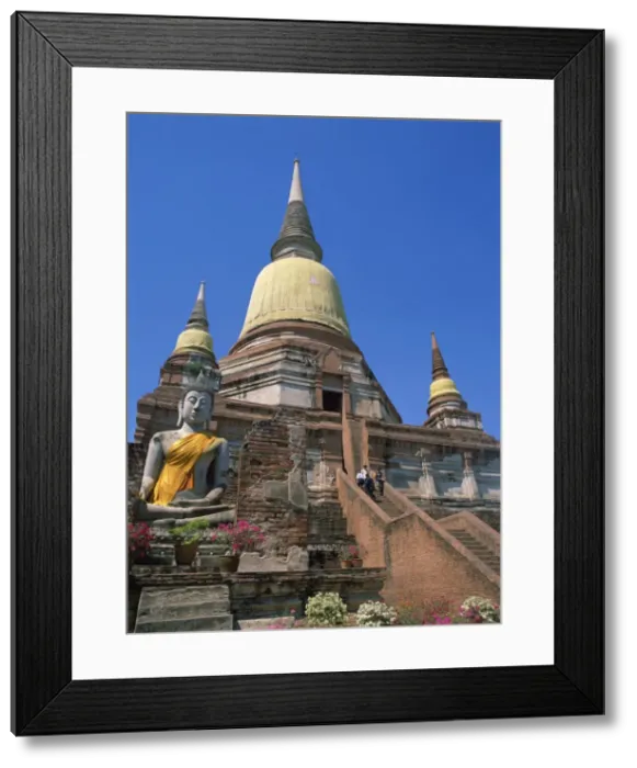 Framed Print : Statue of a seated Buddha below the temple of Wat Yai Framed Print : Statue of a seated Buddha below the temple of Wat Yai