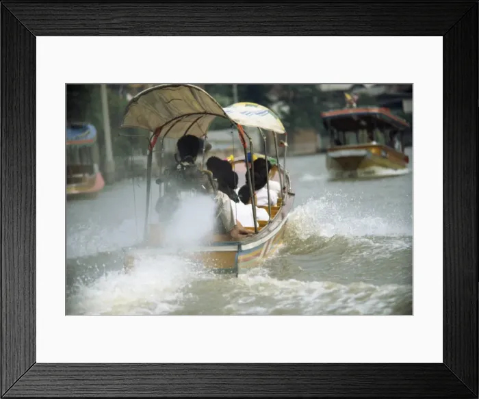 Framed Print : Long tail boat river ferry on the klongs in Bangkok Framed Print : Long tail boat river ferry on the klongs in Bangkok