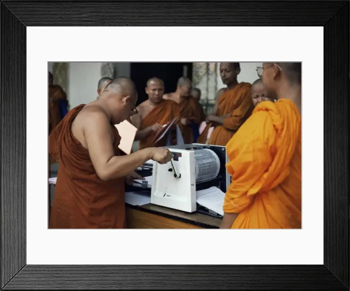 Framed Print : Buddhist monks using stencil machine Framed Print : Buddhist monks using stencil machine