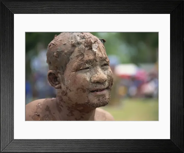 Framed Print : Portrait of a Worship man with a muddy face during Framed Print : Portrait of a Worship man with a muddy face during