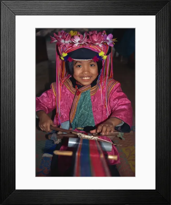 Framed Print : Hill tribe girl weaving on a narrow loom in Chiang Mai Framed Print : Hill tribe girl weaving on a narrow loom in Chiang Mai