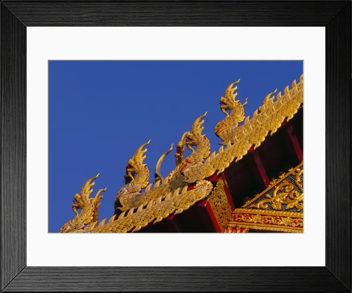 Framed Print : Nagas (sacred snakes) decorating temple roof Framed Print : Nagas (sacred snakes) decorating temple roof