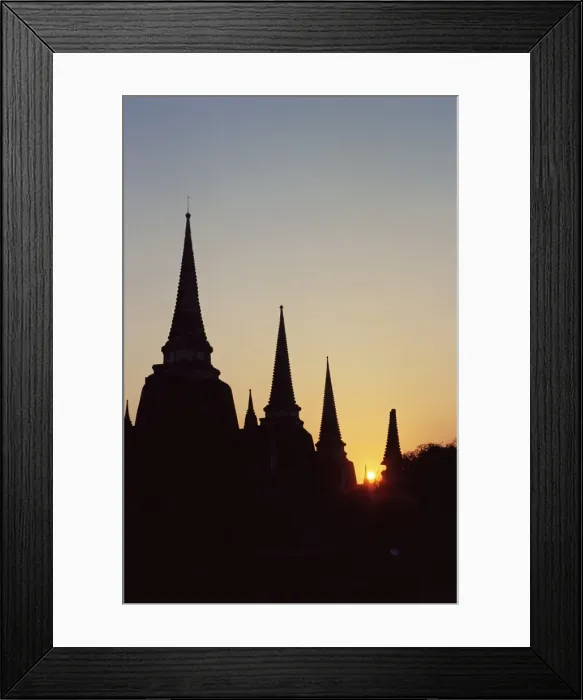 Framed Print : Chedis (pagodas) (stupas) in silhouette at sunset Framed Print : Chedis (pagodas) (stupas) in silhouette at sunset