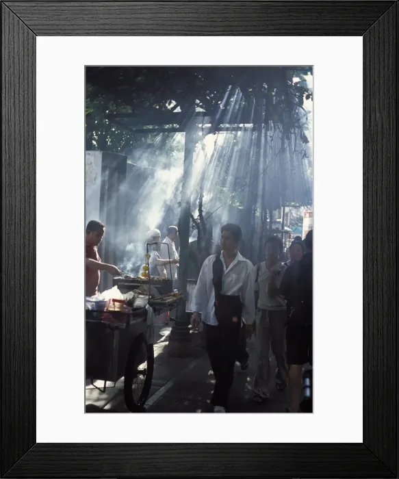 Framed Print : Street vendors selling grilled meat to passers-by on train platform Framed Print : Street vendors selling grilled meat to passers-by on train platform