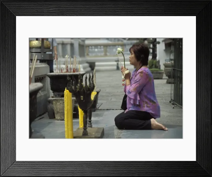 Framed Print : Thai Buddhist woman praying at temple Framed Print : Thai Buddhist woman praying at temple