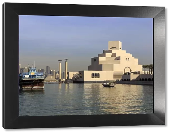 Museum of Islamic Art, dhow and modern city skyline of West Bay, from Al-Corniche