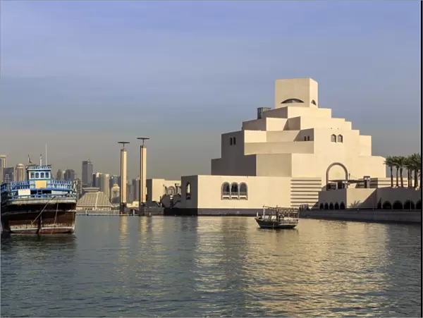 Museum of Islamic Art, dhow and modern city skyline of West Bay, from Al-Corniche