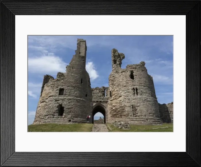 Framed Print : Walkers arrive at historic Dunstanburgh Castle, Northumberland, England, United Kingdom Framed Print : Walkers arrive at historic Dunstanburgh Castle, Northumberland, England, United Kingdom