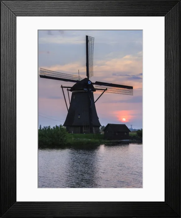 Framed Print : Blue sky and pink clouds on the windmill reflected in the canal at dawn, Kinderdijk