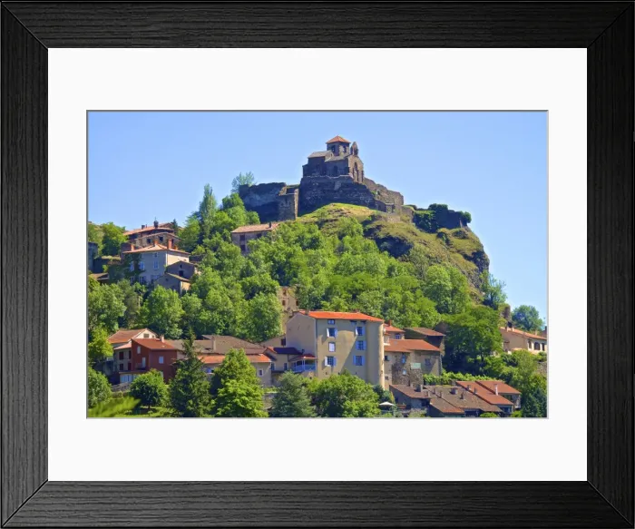 Framed Print : Medieval castle dating from the 15th century, and church of St. Madeleine, Saint Ilpize village Framed Print : Medieval castle dating from the 15th century, and church of St. Madeleine, Saint Ilpize village