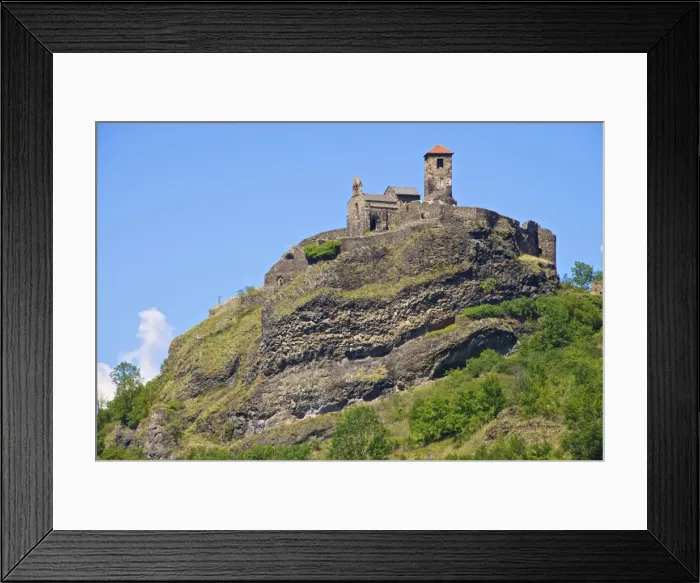 Framed Print : Medieval castle dating from the 15th century, and church of St. Madeleine, Saint Ilpize village Framed Print : Medieval castle dating from the 15th century, and church of St. Madeleine, Saint Ilpize village