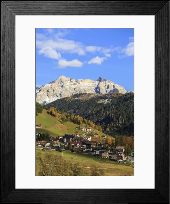 Framed Print : Colourful woods frame the village and the high peaks in autumn, Gardena Valley, South Tyrol Framed Print : Colourful woods frame the village and the high peaks in autumn, Gardena Valley, South Tyrol