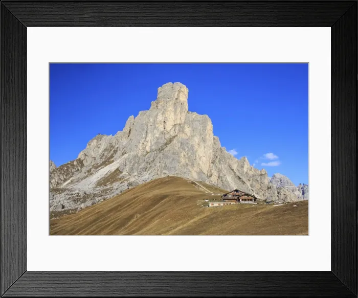 Framed Print : Autumnal view of the high rocky peak of Ra Gusela from Falzarego Pass, Dolomites of Belluno Framed Print : Autumnal view of the high rocky peak of Ra Gusela from Falzarego Pass, Dolomites of Belluno