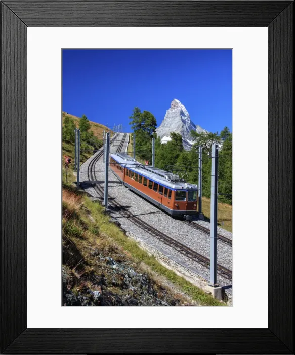 Framed Print : The swiss Bahn train runs on its route with the Matterhorn in the background, Gornergrat Framed Print : The swiss Bahn train runs on its route with the Matterhorn in the background, Gornergrat