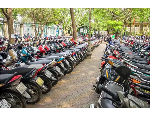 Rows of motorbikes parked in central Ho Chi Minh City (Saigon), Vietnam, Indochina