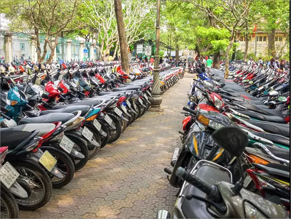 Rows of motorbikes parked in central Ho Chi Minh City (Saigon), Vietnam, Indochina