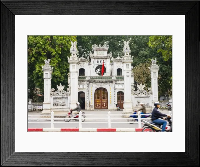 Framed Print : Motorbikes pass in front of Quan Thanh Temple (Den Quan Thanh) gate, Ba Dinh District Framed Print : Motorbikes pass in front of Quan Thanh Temple (Den Quan Thanh) gate, Ba Dinh District