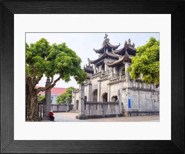 Framed Print : Vietnamese woman in front of Phat Diem Cathedral, Phat Diem, Ninh Binh Province, Vietnam Framed Print : Vietnamese woman in front of Phat Diem Cathedral, Phat Diem, Ninh Binh Province, Vietnam