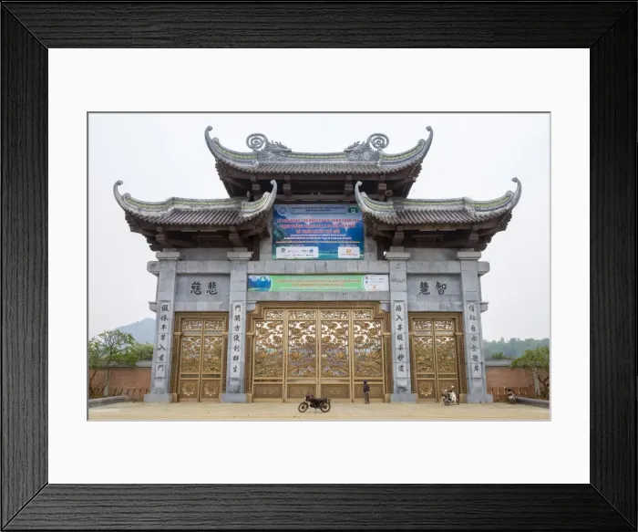 Framed Print : A person looking up at Bai Dinh Temple (Chua Bai Dinh) gate, Gia Vien District, Ninh Binh Province Framed Print : A person looking up at Bai Dinh Temple (Chua Bai Dinh) gate, Gia Vien District, Ninh Binh Province