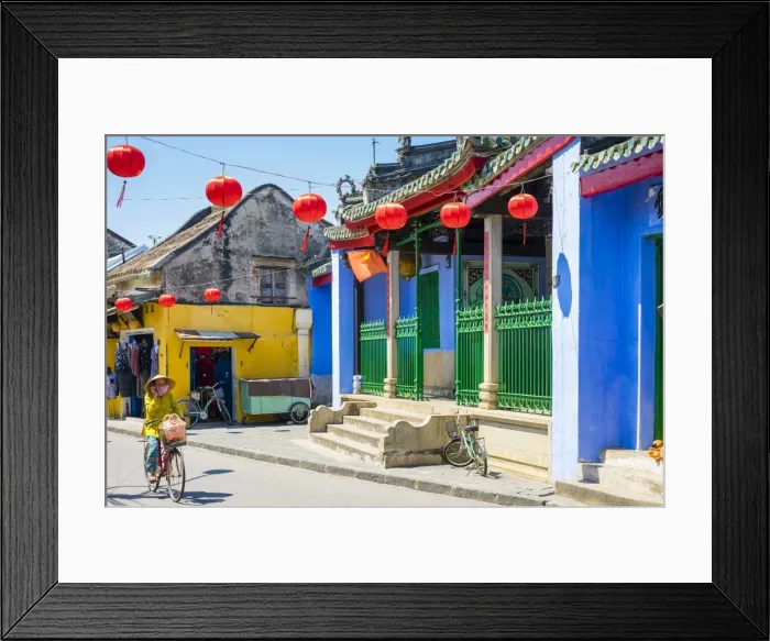 Framed Print : Woman riding a bicycle past Trung Hoa Assembly Hall (Ngu Bang Assembly Hall), Hoi An Framed Print : Woman riding a bicycle past Trung Hoa Assembly Hall (Ngu Bang Assembly Hall), Hoi An