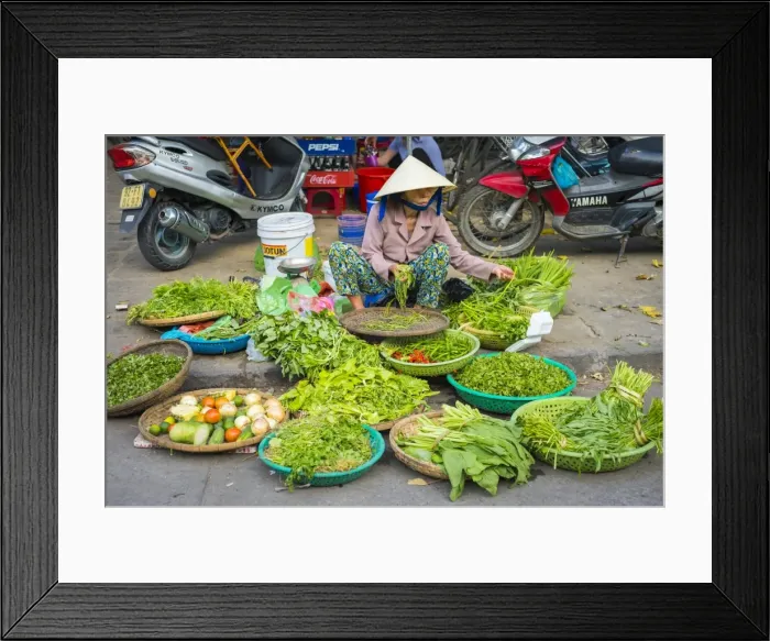 Framed Print : Woman selling herbs and vegetables at the central market in Hoi An, Quang Nam Province Framed Print : Woman selling herbs and vegetables at the central market in Hoi An, Quang Nam Province
