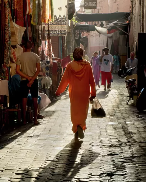 Woman in pink, Medina souk, Marrakech, Morocco, North Africa, Africa