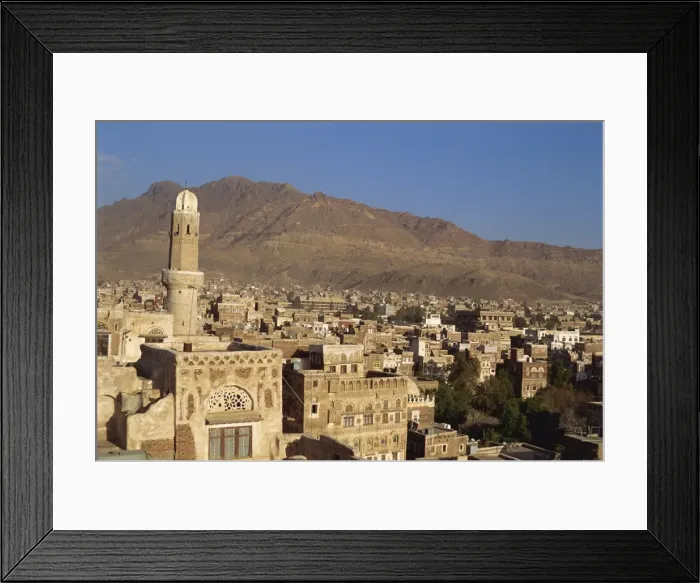 Framed Print : View over decorated houses and minaret of the old Babylonian Framed Print : View over decorated houses and minaret of the old Babylonian